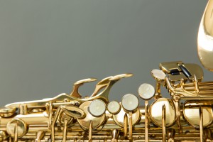 Saxophone on a gray background